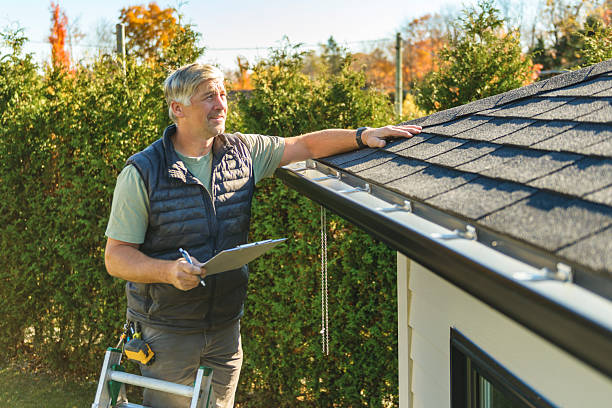 Professional Roofing technician working in North Sutton, NH